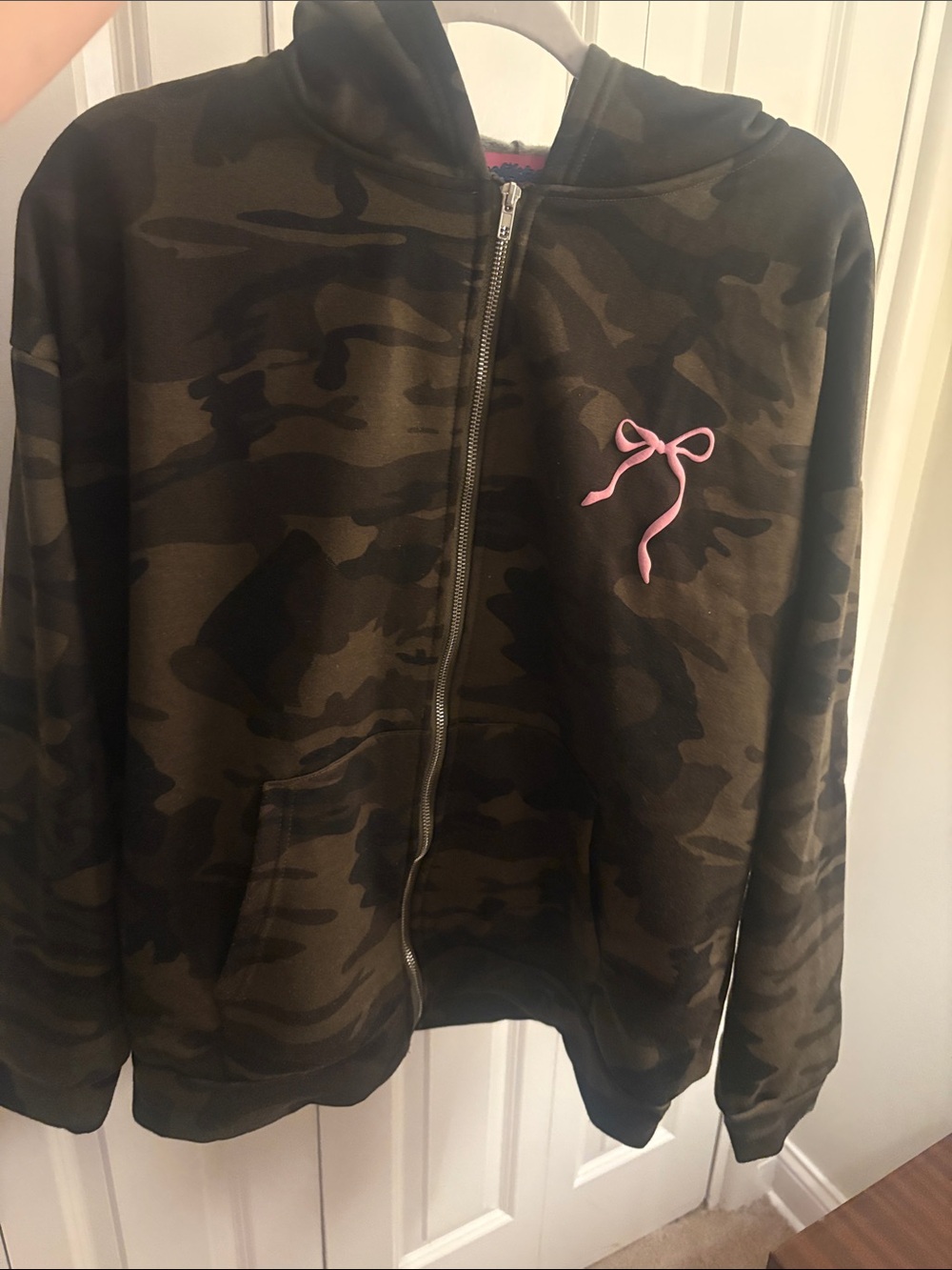 Woman Camo Zip Hoodie with Pink Bow Accent